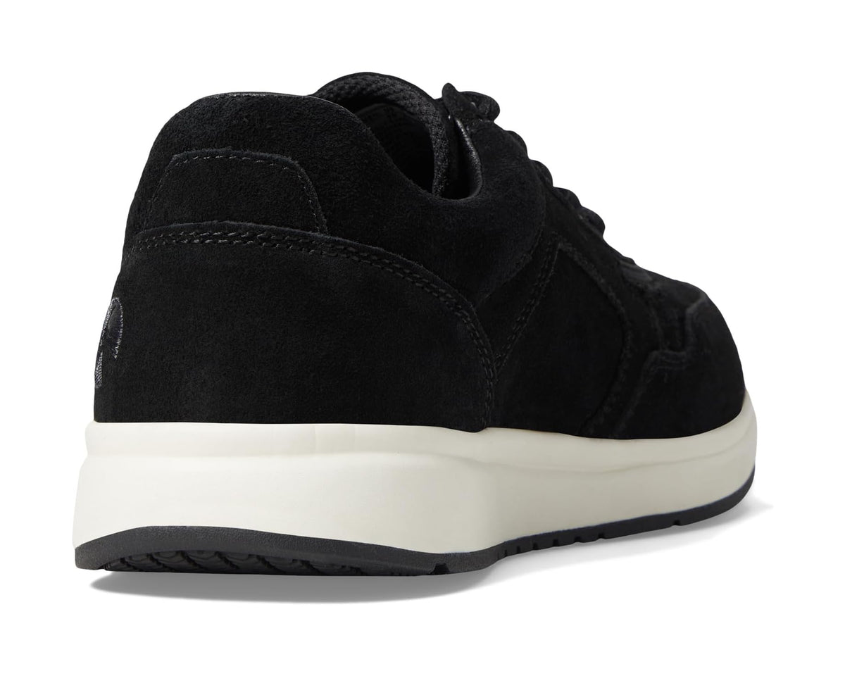 Black suede jogger sneakers with cushioned heel and white midsole