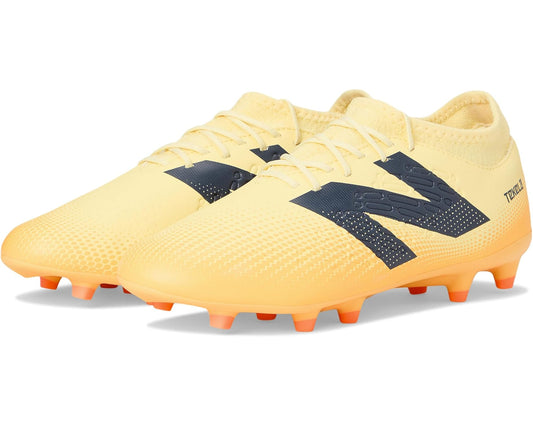 Unisex soccer cleats with cream and navy upper, orange studs, laced FG sole