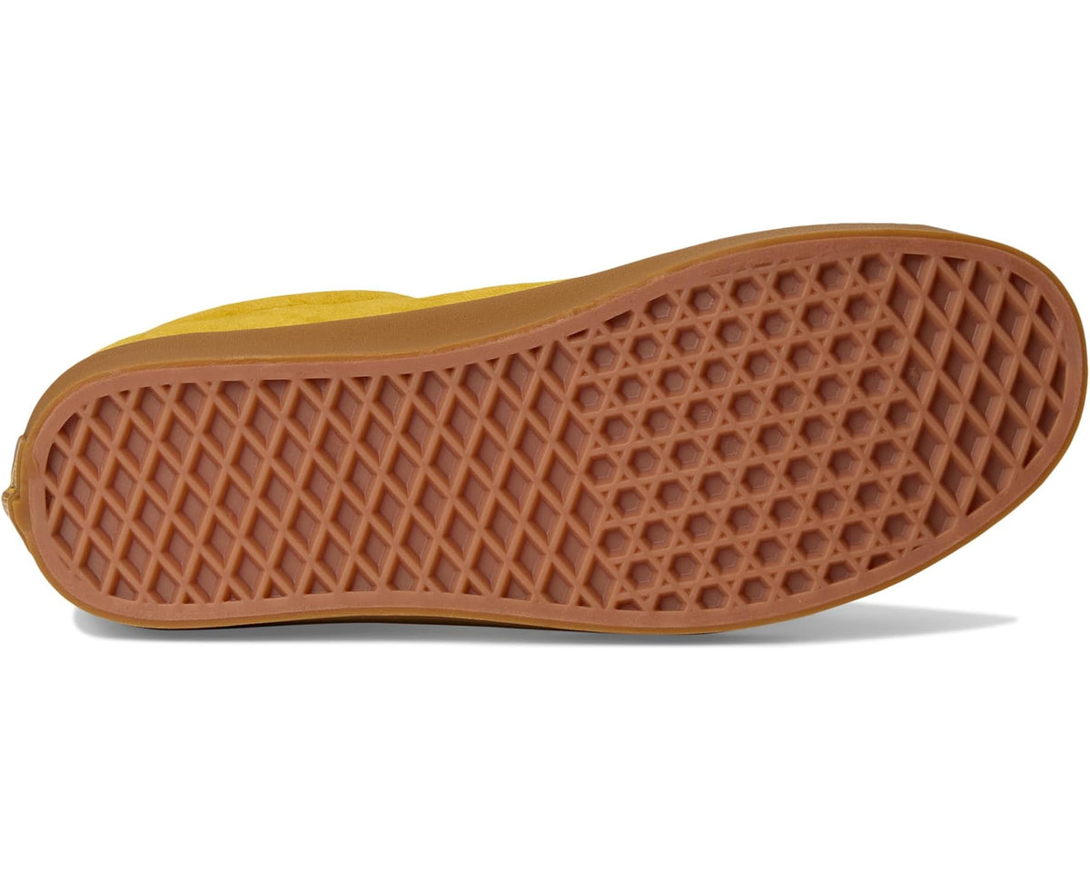 Gum rubber outsole with textured grid tread for mustard yellow low-top sneakers