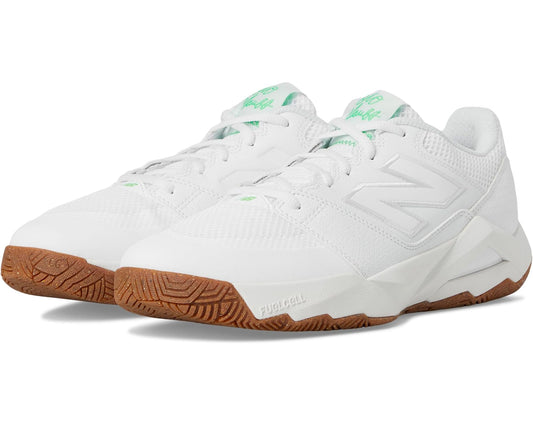 Men's New Balance tennis shoes, white mesh with green accents and brown rubber outsole