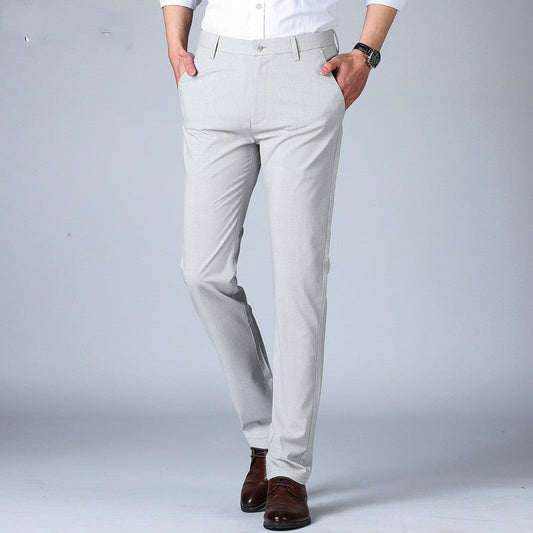 Light grey men's slim-fit thin pants with belt loops and button fly