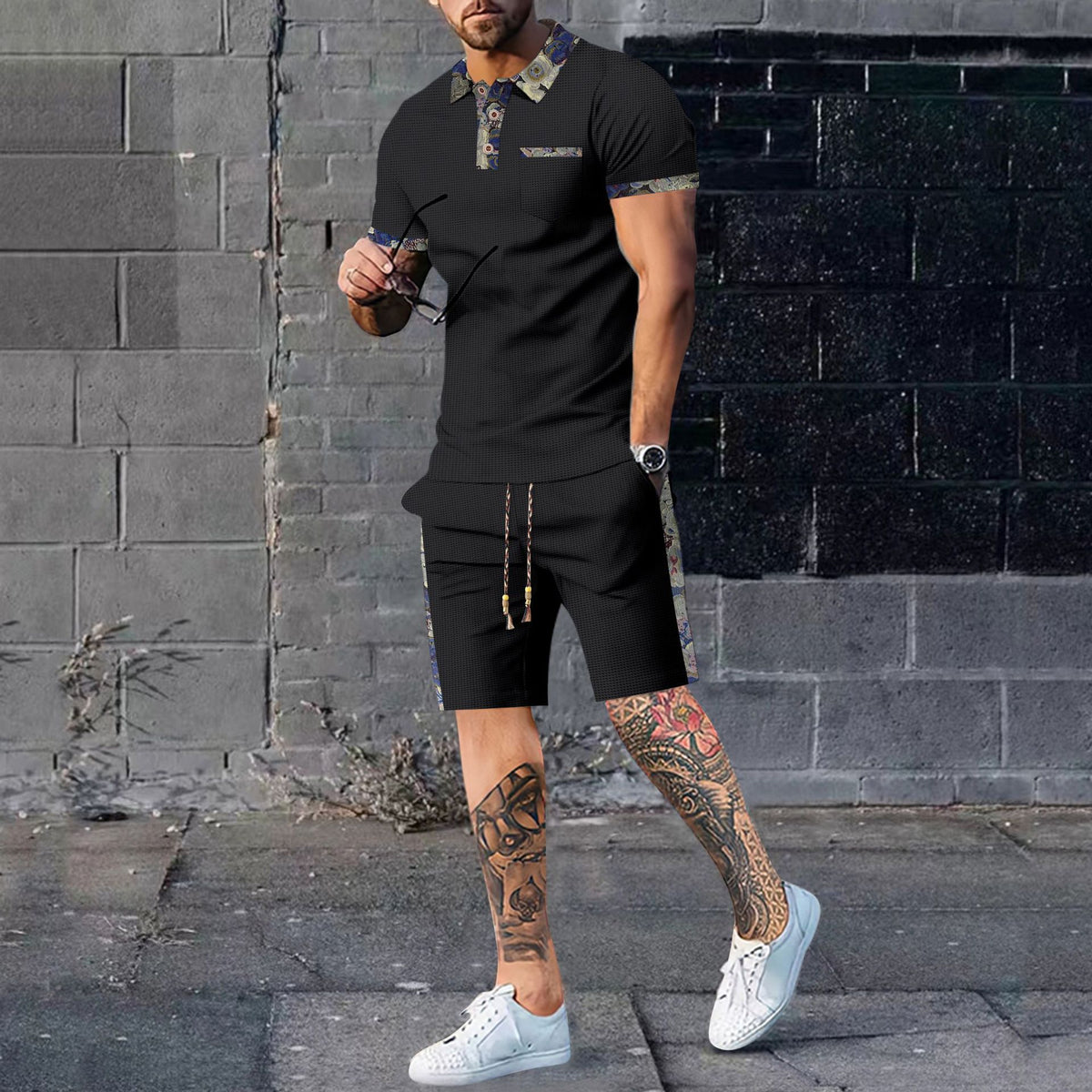 Men's casual two-piece set: black short-sleeve polo shirt and matching shorts