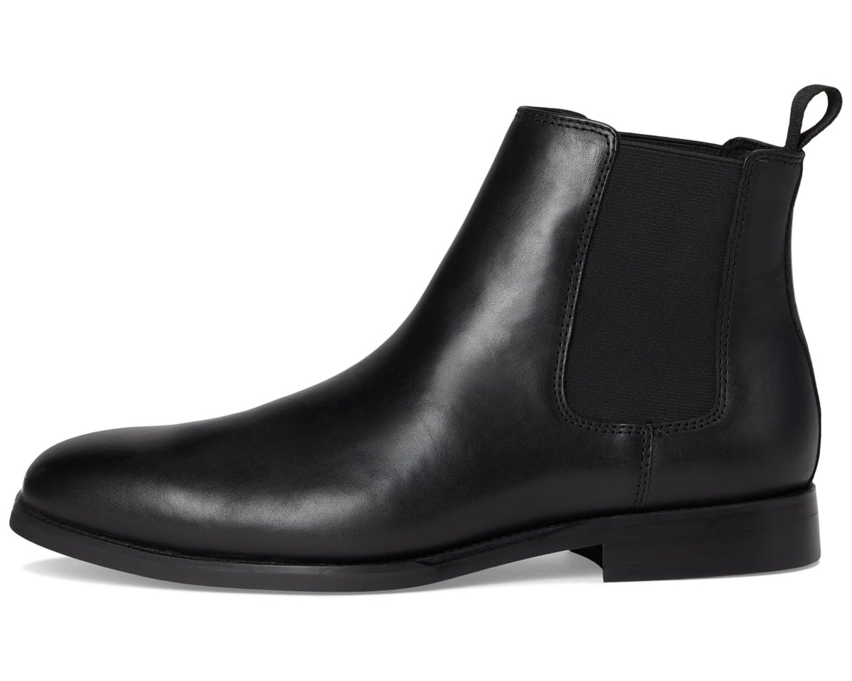 Men's black leather chelsea boot with elastic side panel and pull loop