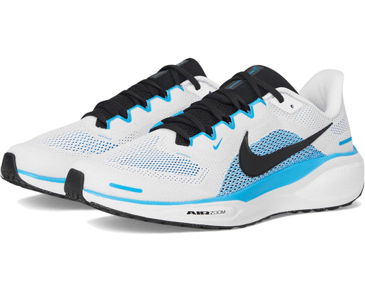 Men's Nike running shoe in white, black, and blue with black laces and mesh upper.