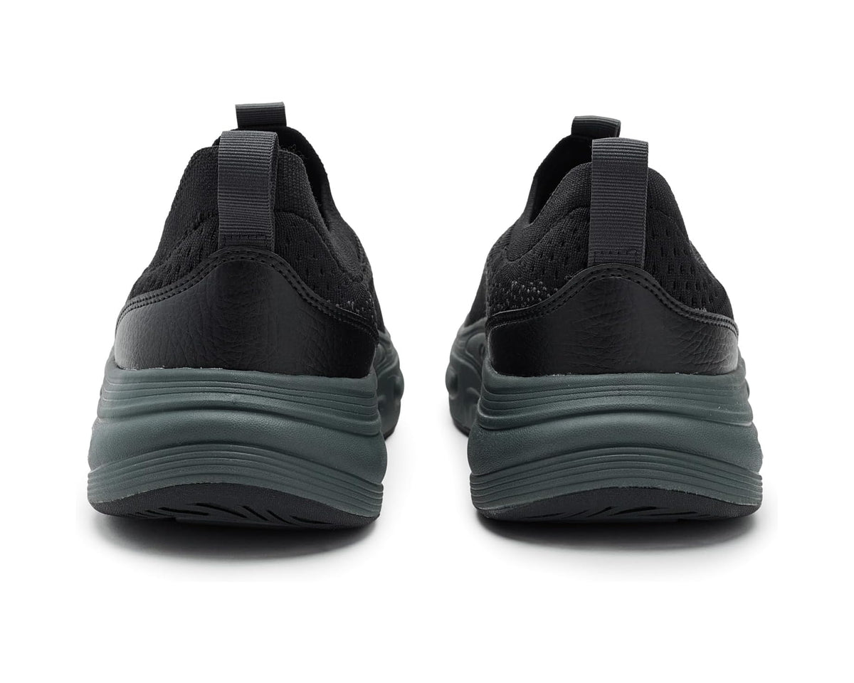 Back view of black knit sock shoes with teal rubber midsole and heel pull tabs