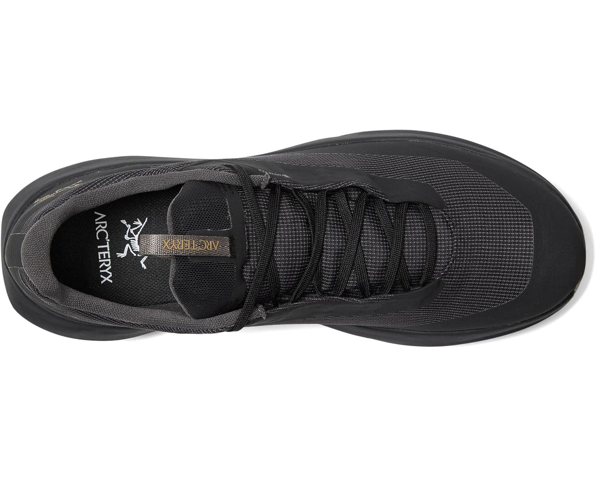 Unisex black shoe side with laced upper and padded tongue collar