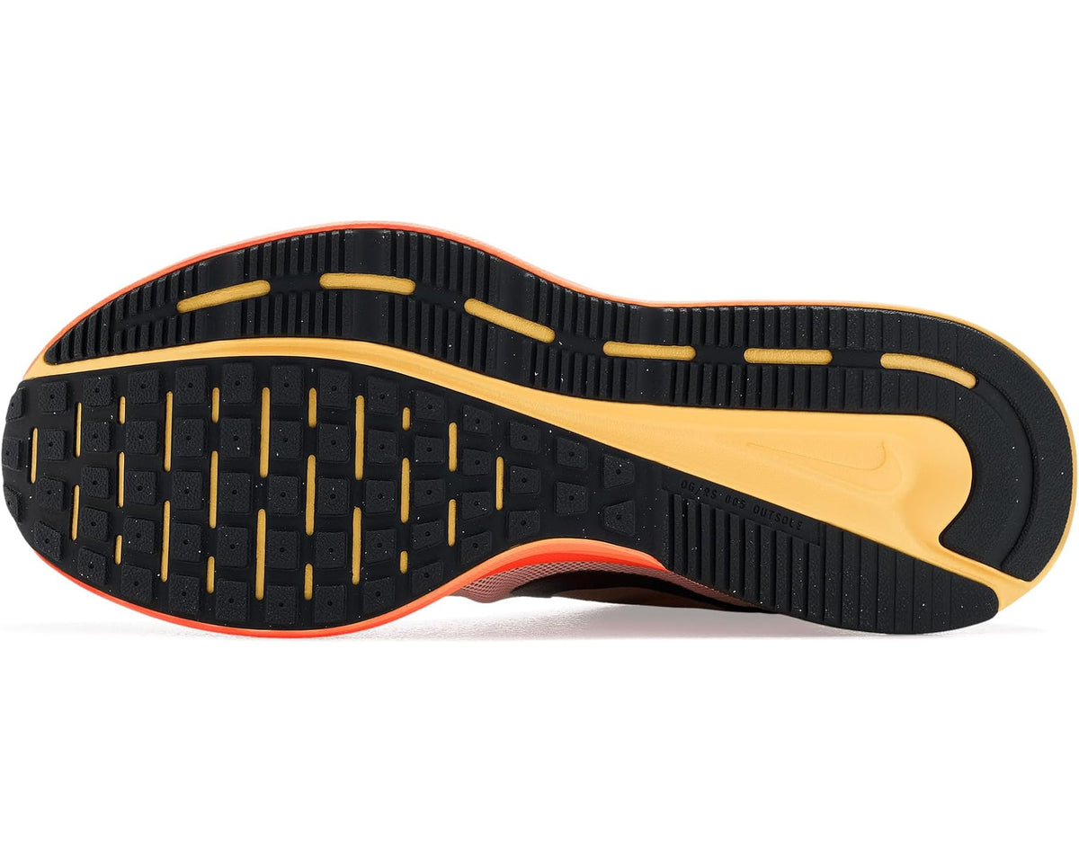 Men's Nike running shoe outsole with black traction and orange/yellow edge.