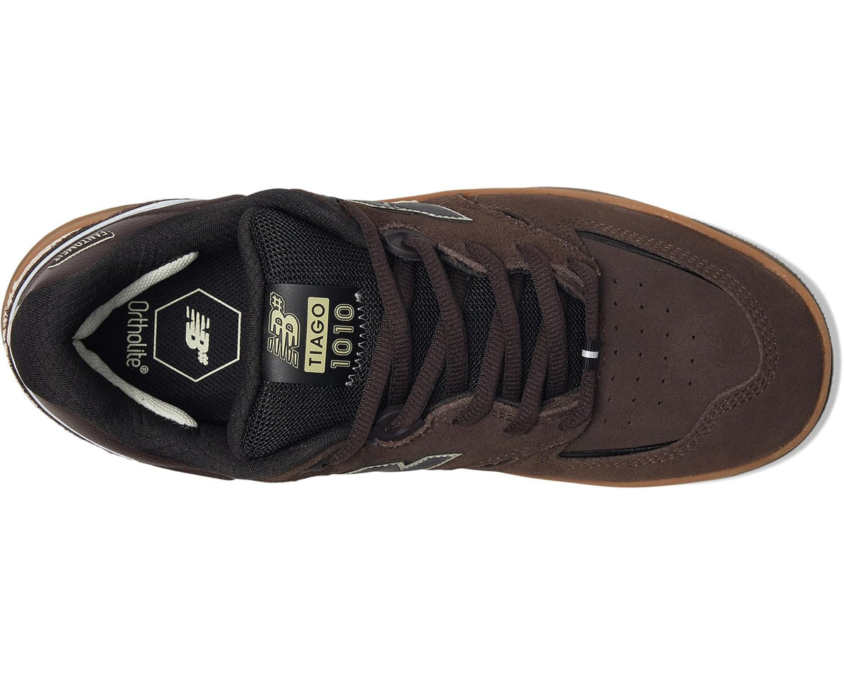 Brown New Balance 1010 interior view, black lining and laces with cushioned collar.