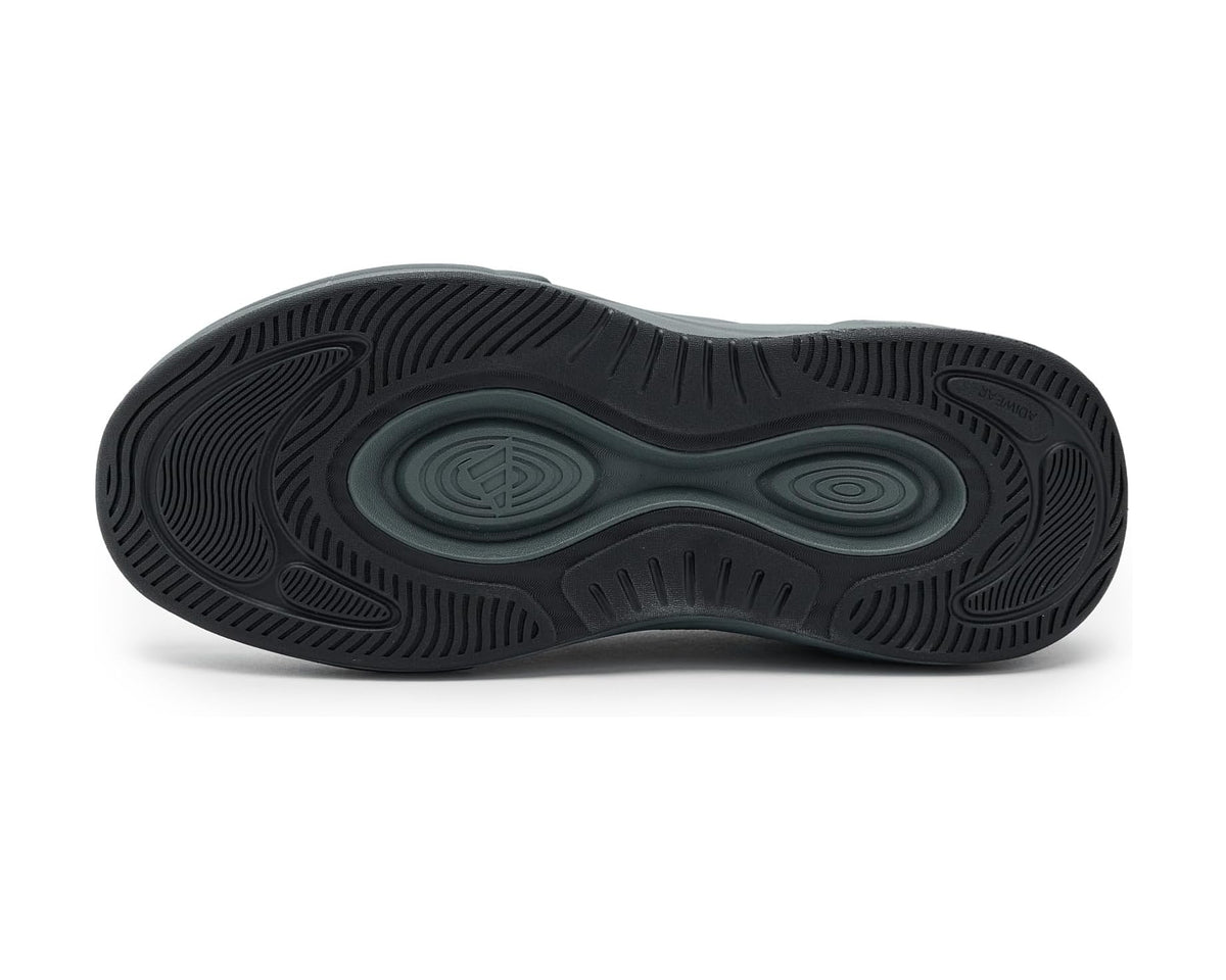 Black rubber outsole with tread pattern and circular traction zones for sock shoes