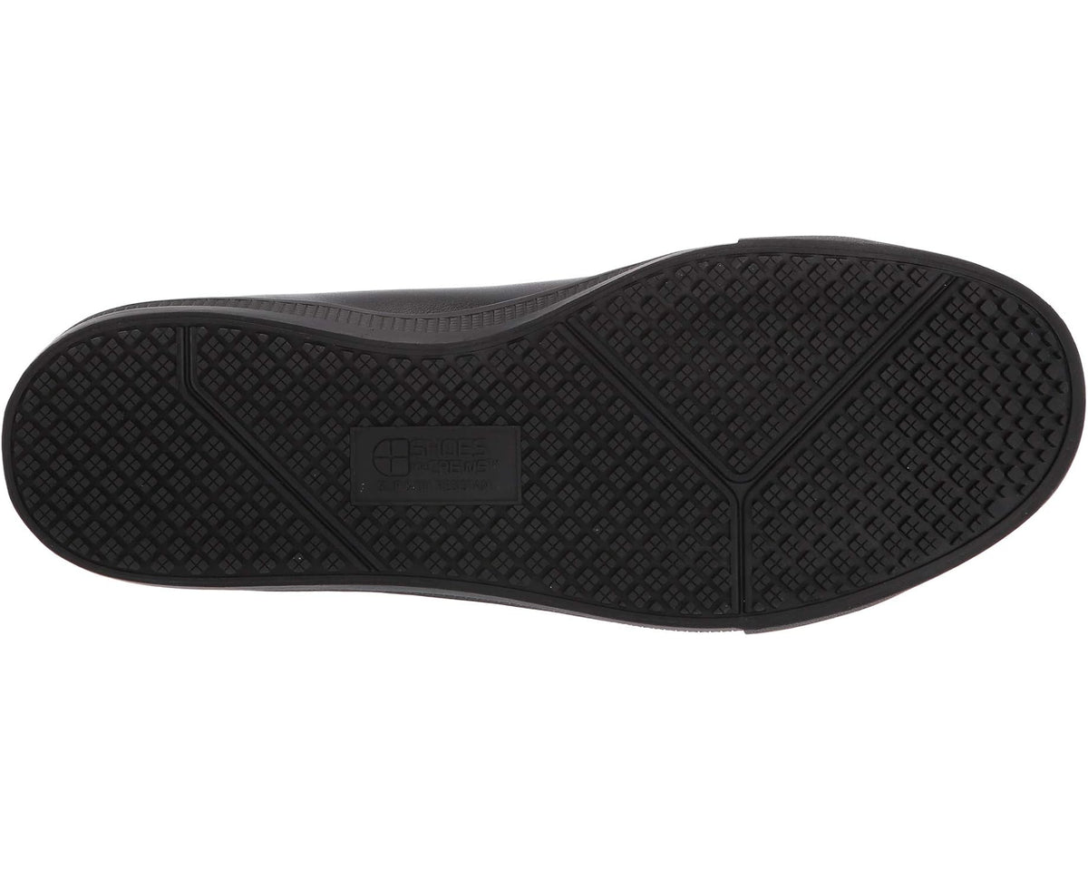 Black rubber outsole with textured tread pattern and heel/arch traction