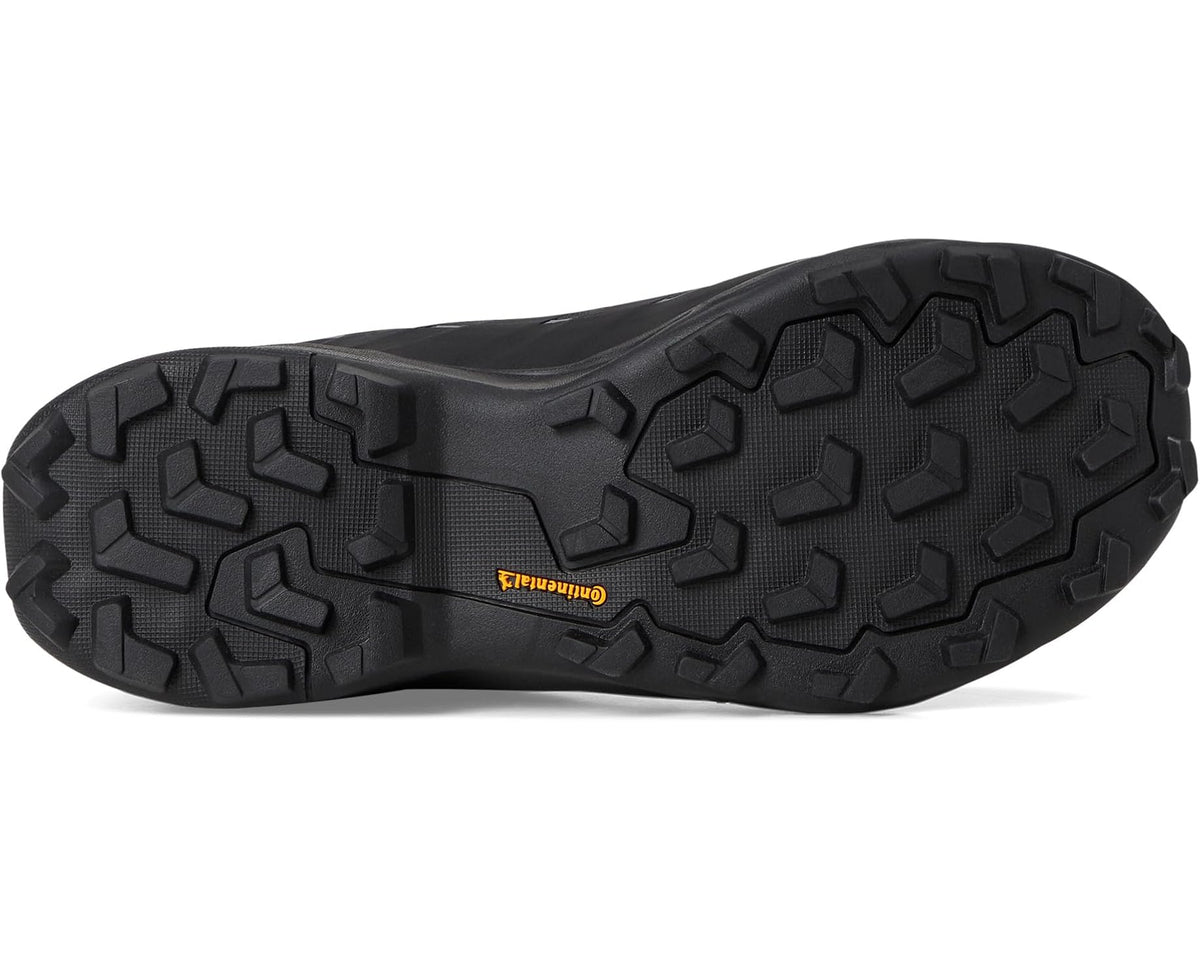 Black hiking shoe outsole with deep lug tread for off-road grip