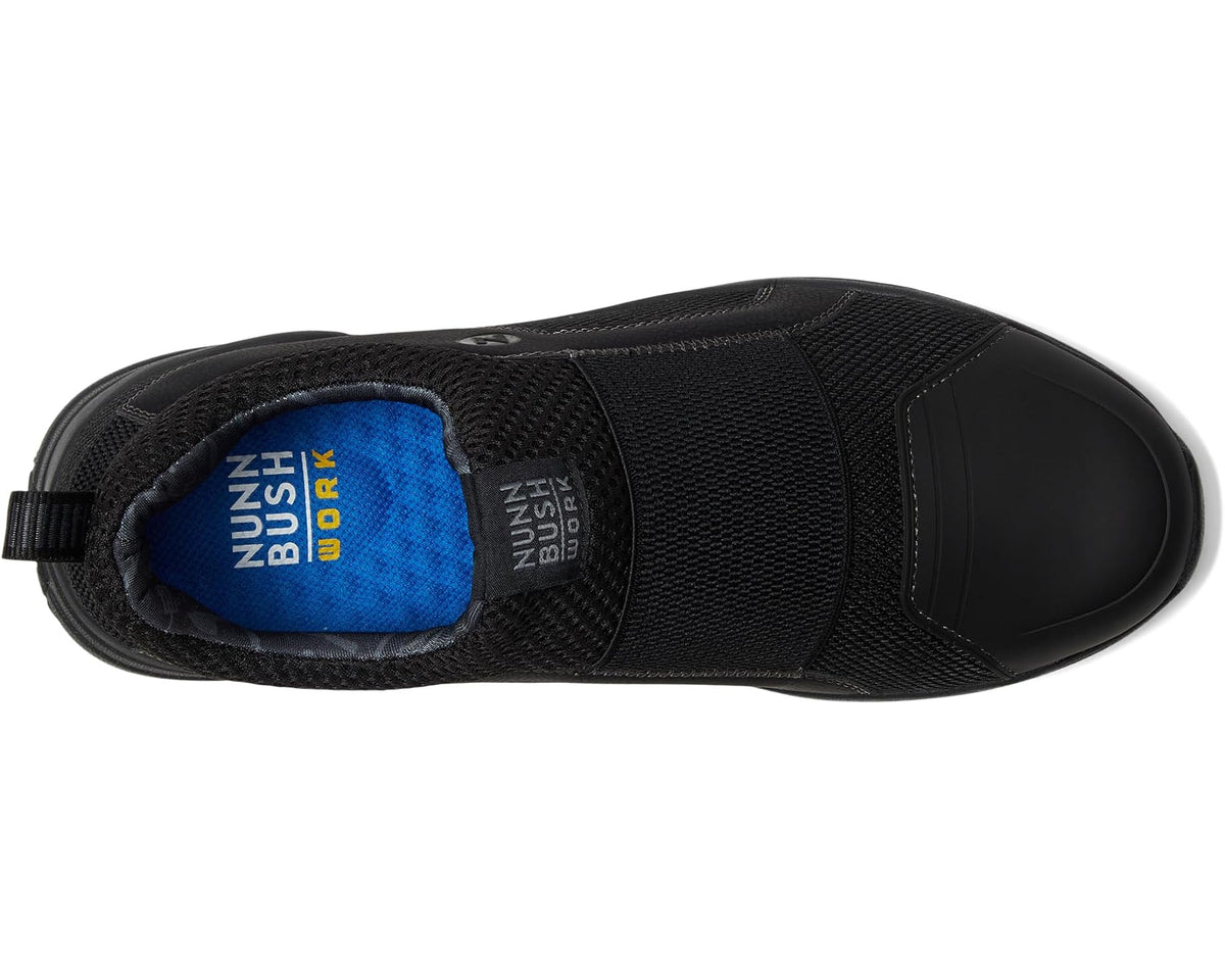 Black slip-on shoe showing side with stretch panel and padded insole lining