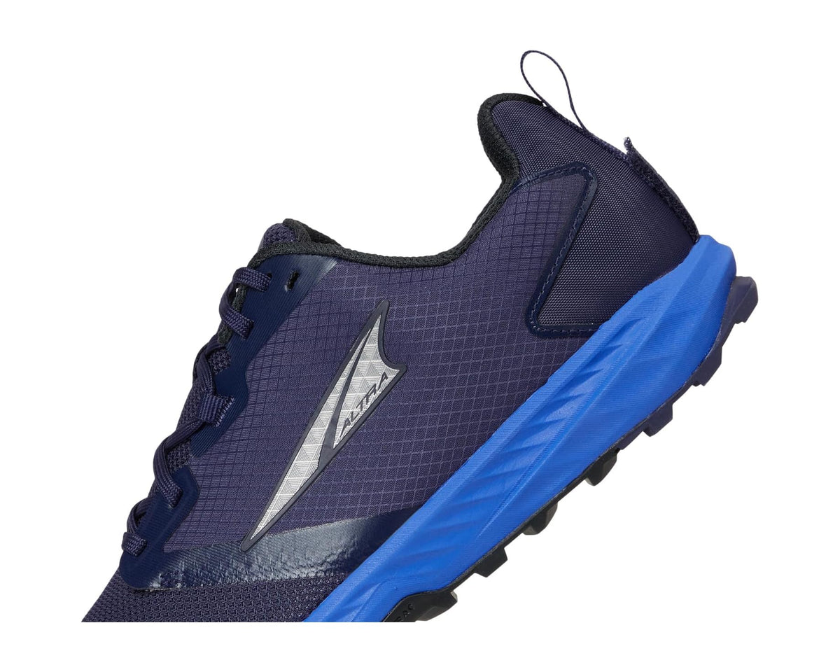 Men's dark blue running shoes with side panel details and blue sole