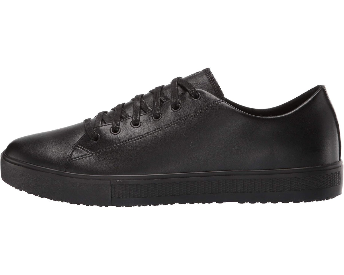 Black lace-up low-top shoes with smooth leather-look upper and rubber toe cap