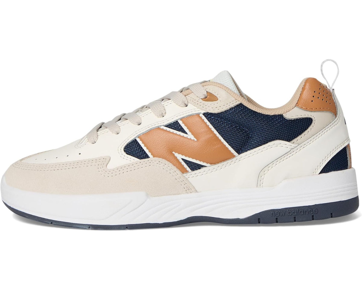 New Balance lace-up sneakers, sea salt panels with navy side stripe and tan trim