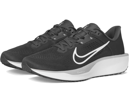 Men's dark gray running shoe with white Nike swoosh and lace-up front