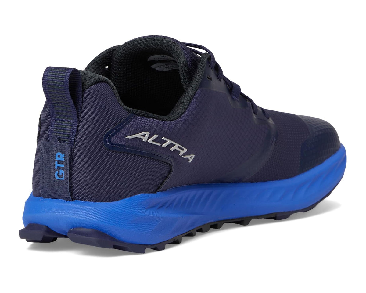 Men's dark blue running shoes with logo on heel and blue outsole