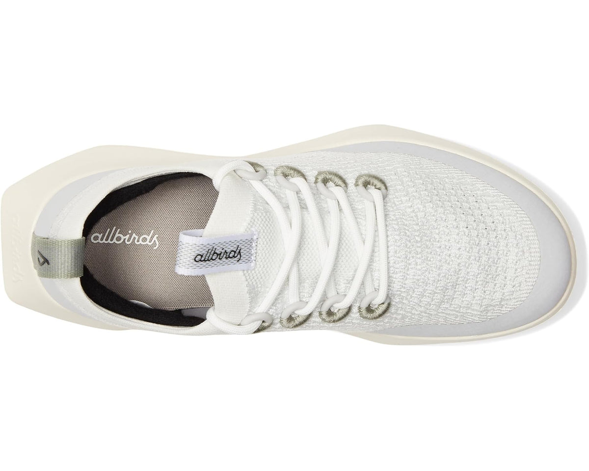 Men's Allbirds sneaker showing lace-up front and dark interior lining, white knit upper
