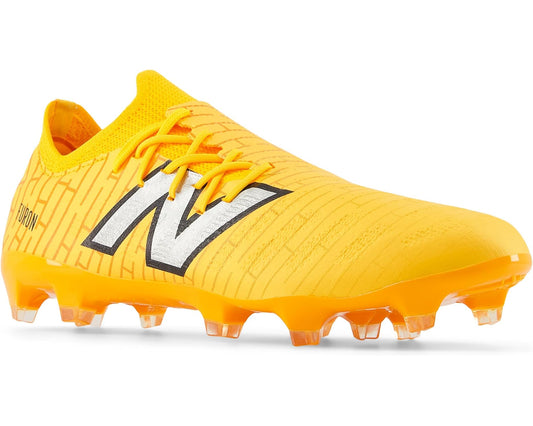 Unisex yellow/orange soccer cleats with gray New Balance logo, lace-up, firm-ground studs