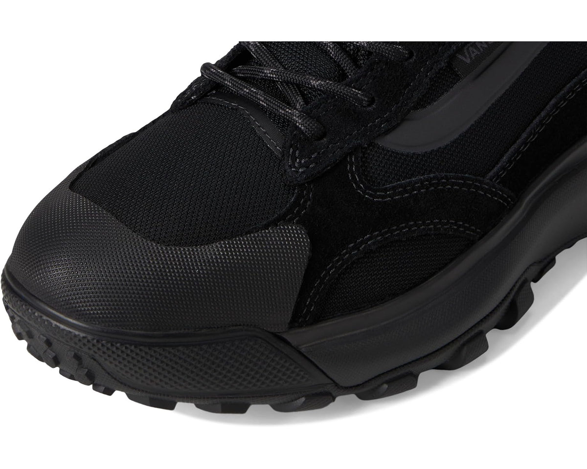Black lace-up mid boot with textured panels and padded tongue
