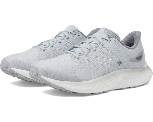 New Balance lace-up running shoes in light grey with cushioned Fresh Foam midsole