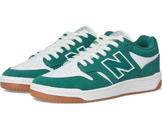 Teal and white New Balance skate shoe with lace-up front and green side branding.