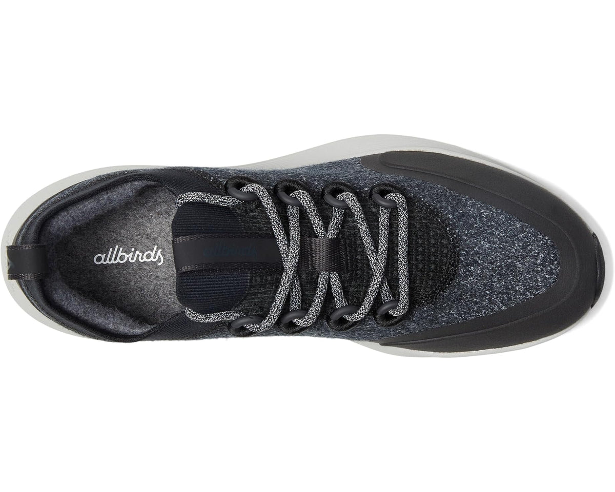 Dark grey speckled lace-up sneaker showing black lining and padded collar, white sole