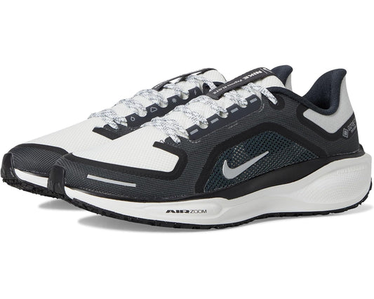 Men's GORE-TEX running shoe in black and white with Nike swoosh, laces, side profile