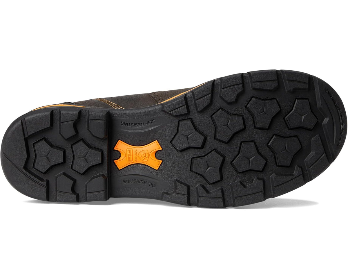 Work boot rubber outsole with hex tread pattern and orange logo patch