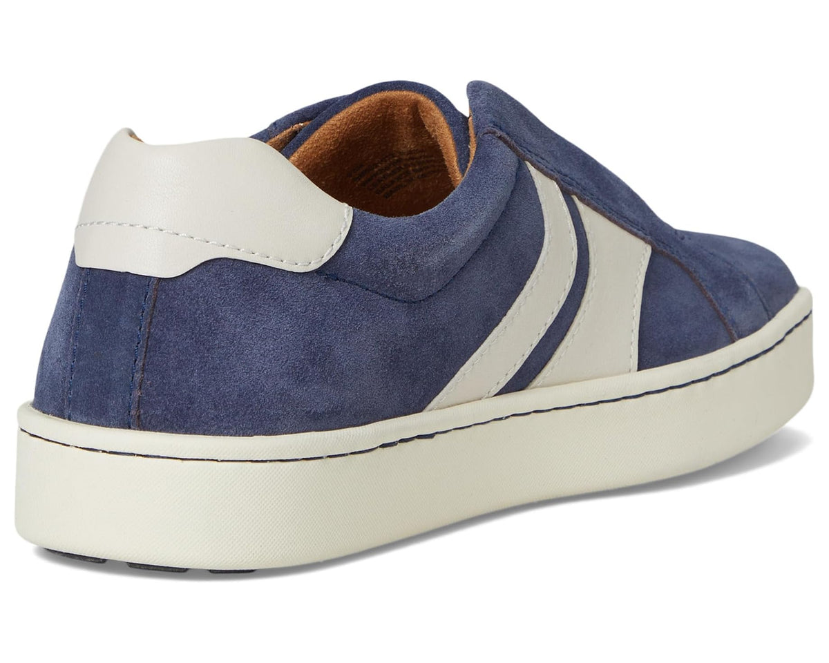 Navy suede slip-on sneaker heel with white panel and tan lining