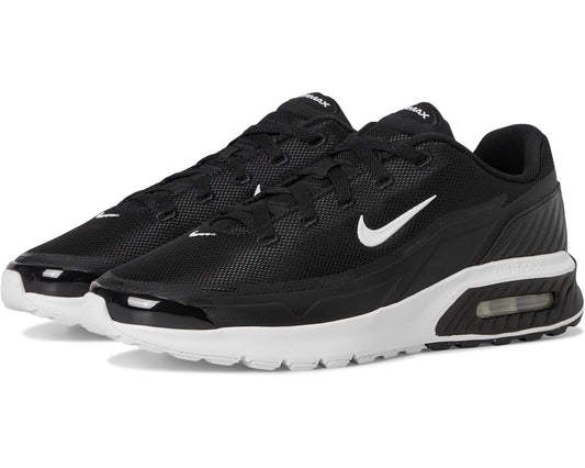 Men's Nike Air Max sneaker in black with white sole; front 3/4 view and Swoosh