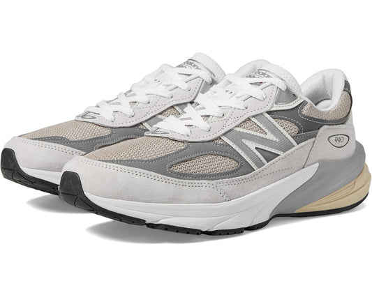 Unisex New Balance 990v6 sneakers in white, gray, and tan with lace-up design