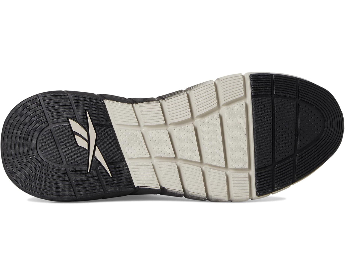 Reebok Nano rubber outsole, black and white tread with curved cushioning pods
