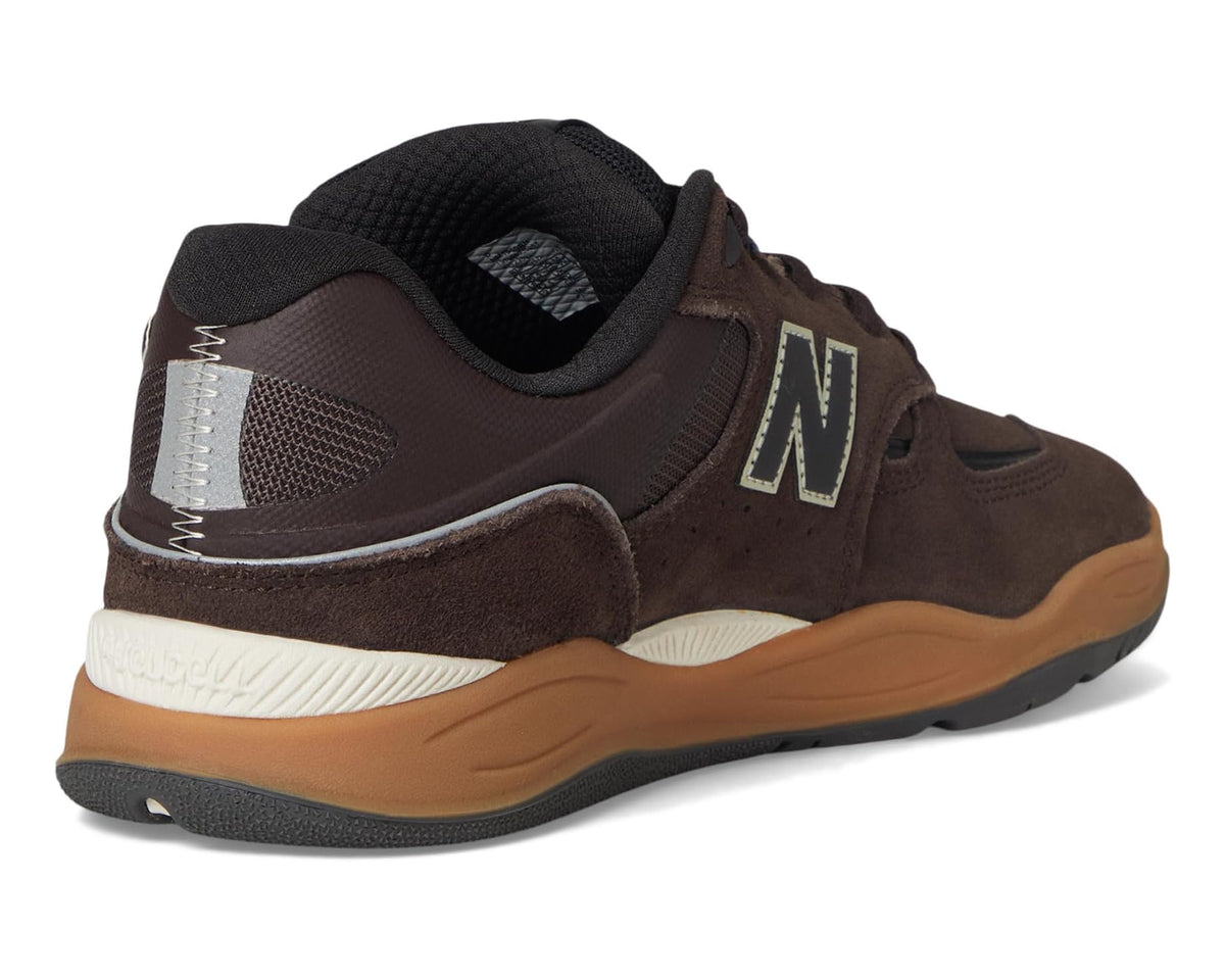 Brown New Balance 1010 heel view, black sock collar and white midsole with tan outsole.