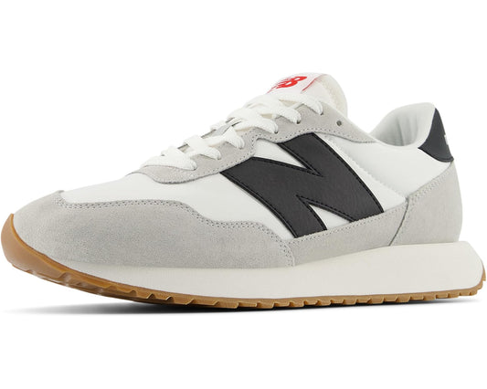 White, grey and black New Balance 237v1 sneaker with lace-up front and gum sole.