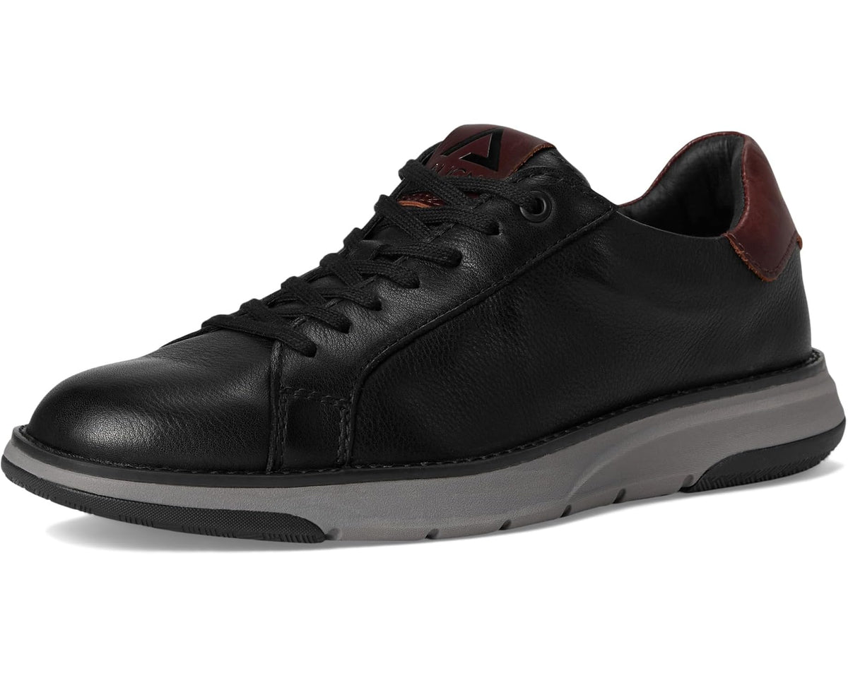 Men's black leather sneaker with lace-up front, brown collar accents, gray sole