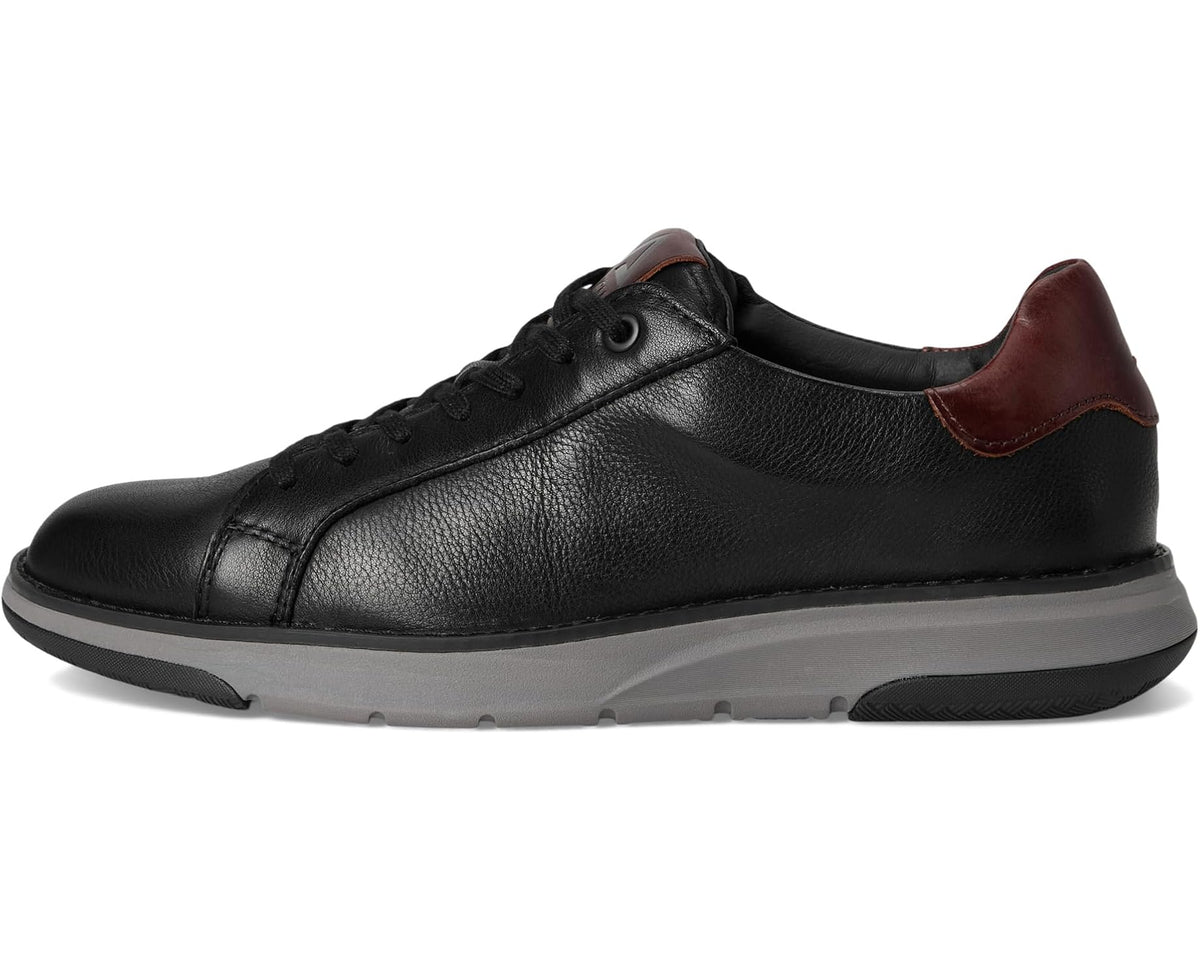 Men's black leather sneaker with lace-up design, brown collar trim, gray sole
