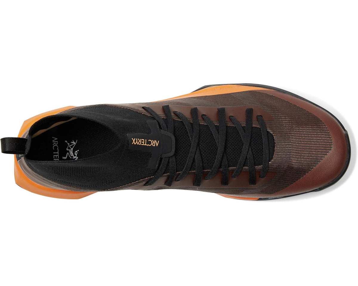 Men's Arc'teryx trail shoe, brown textured upper with black laces and orange sidewall