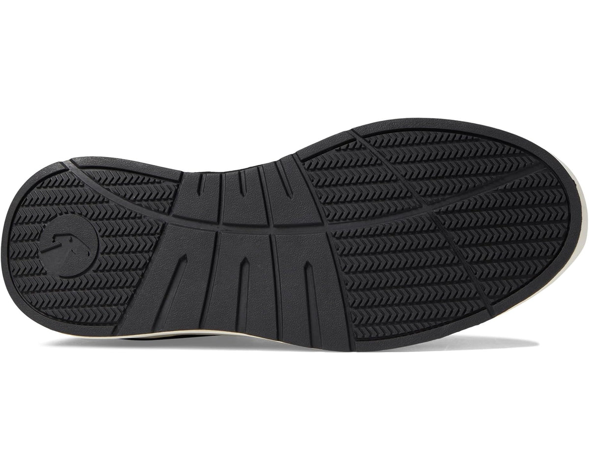 Black suede jogger sneaker outsole with textured traction tread