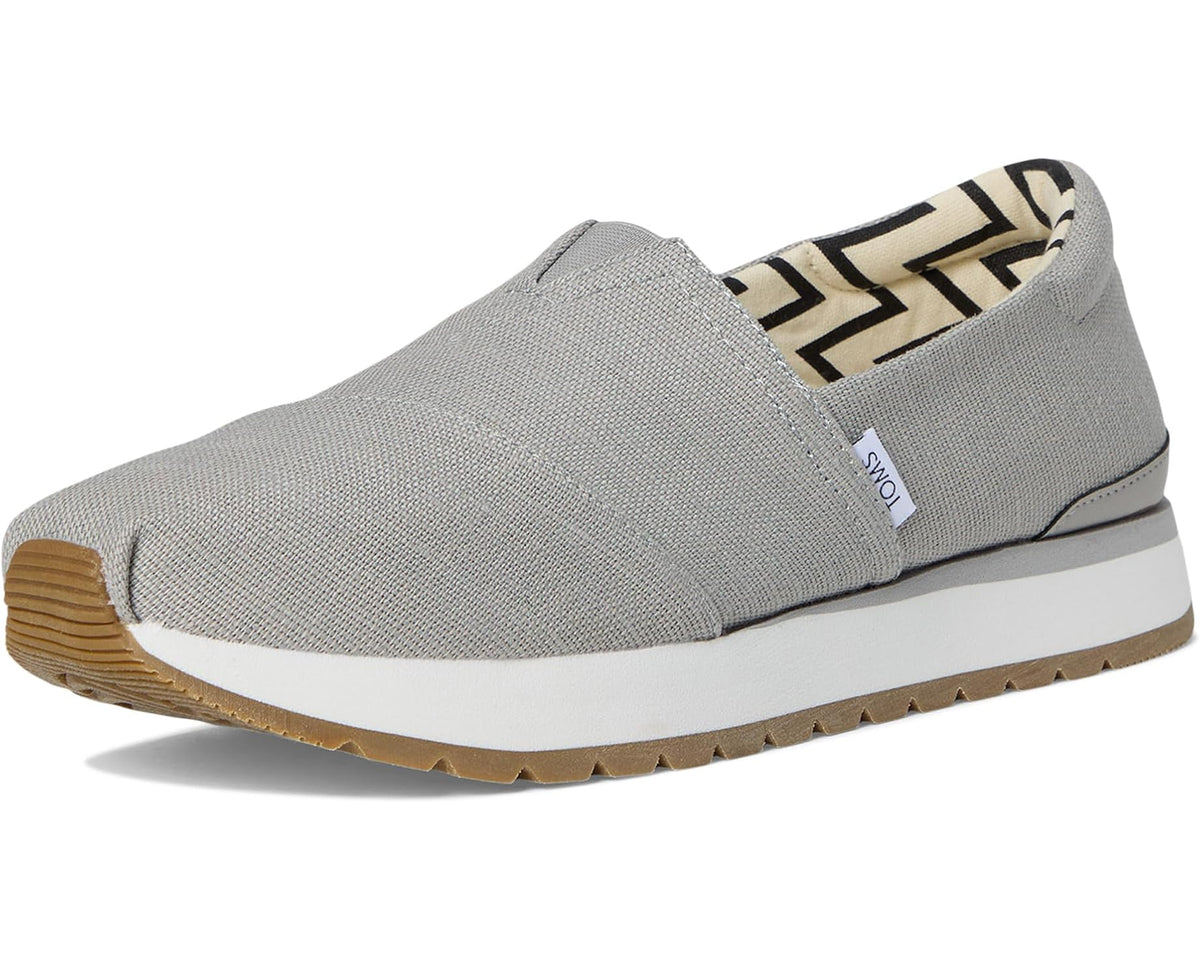 Men's TOMS Resident Plus slip-on shoes in grey fabric with brown tread sole.