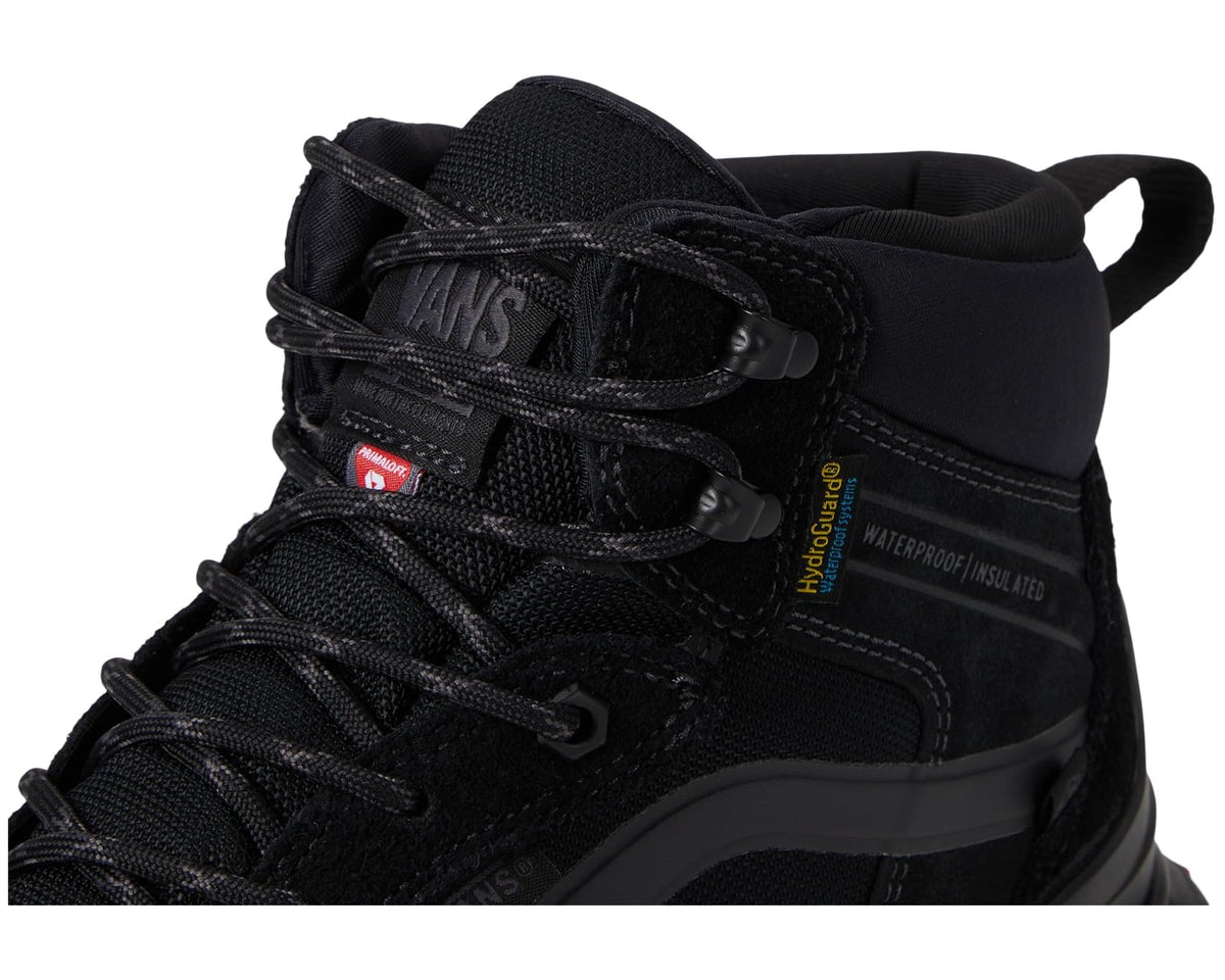 Black boot upper detail with laces, padded tongue, and waterproof seams