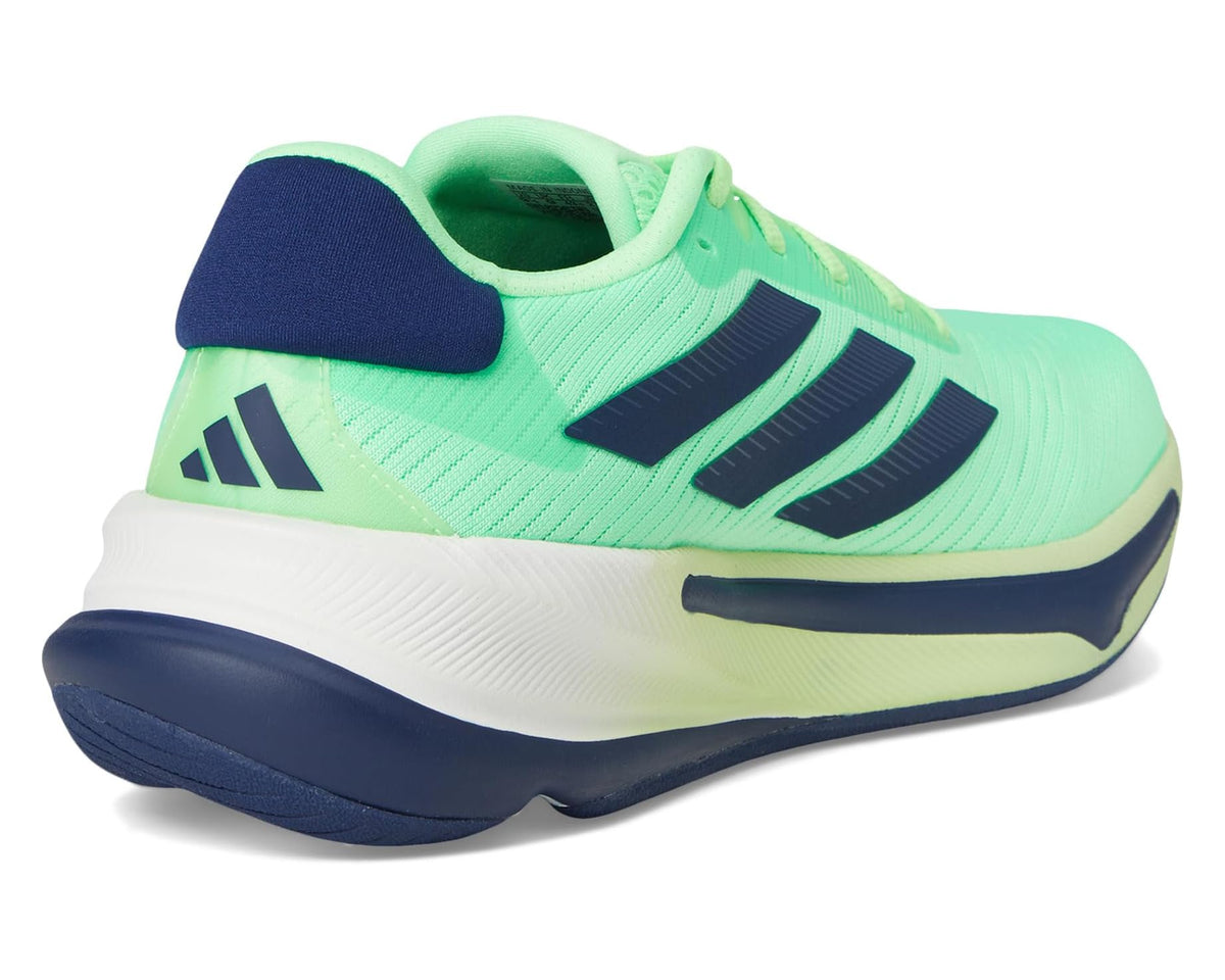 Side and heel of lime green running shoes with navy accents and white midsole