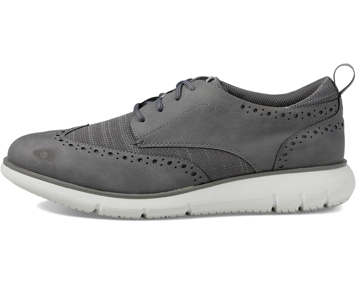 Gray lace-up oxford sneaker with wing tip perforations and white cushioned sole