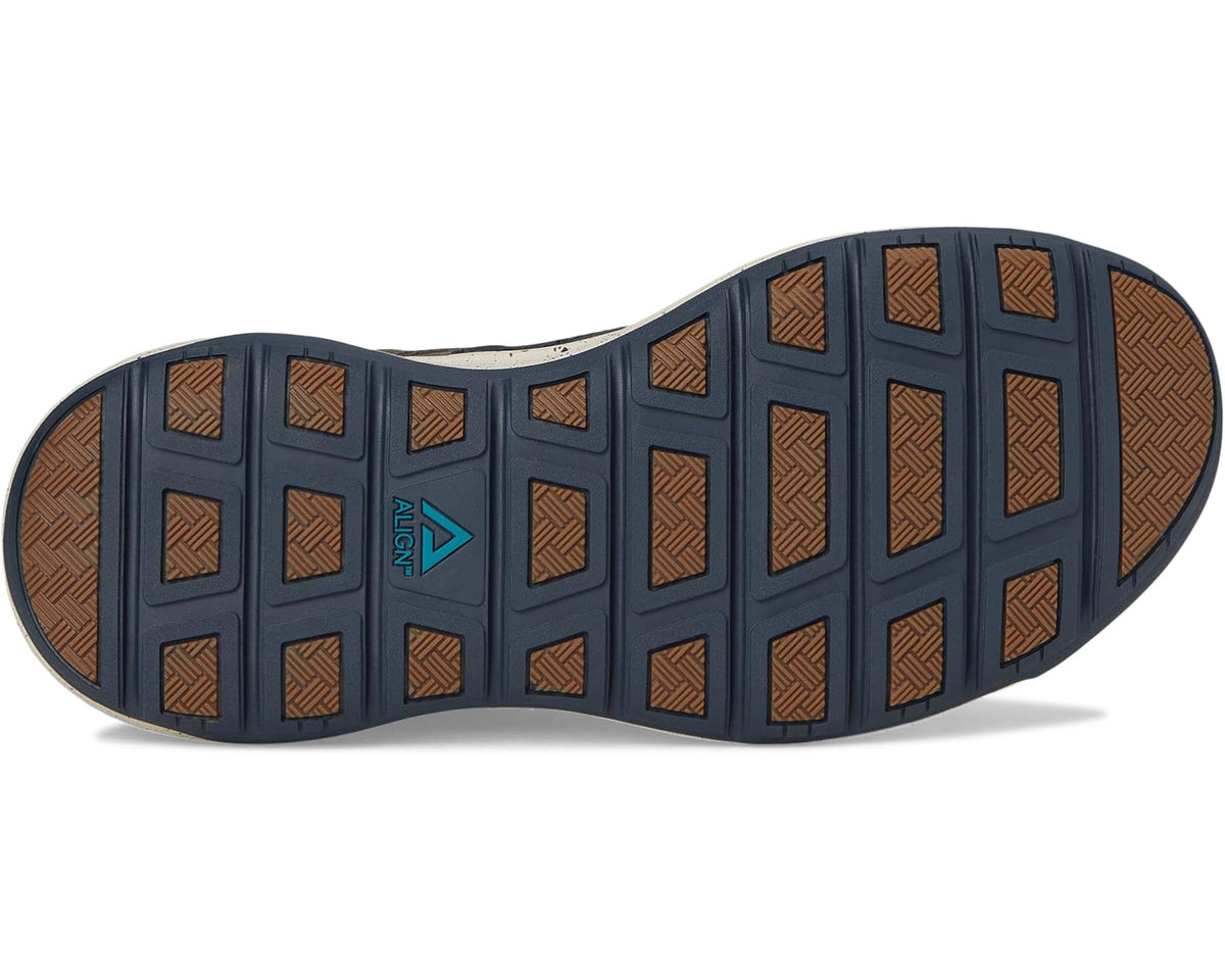 Men's pine green and navy trail sneaker outsole with textured tread