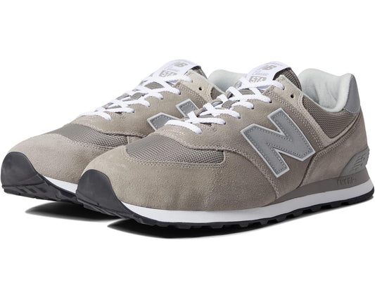 Men's New Balance 574 sneakers in grey and white with lace-up design