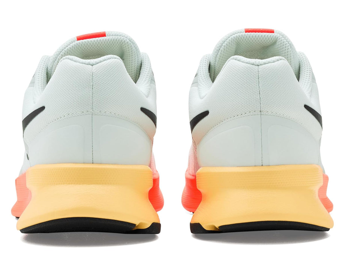 Men's Nike running shoes heels with light gray uppers and orange/yellow heel midsole.