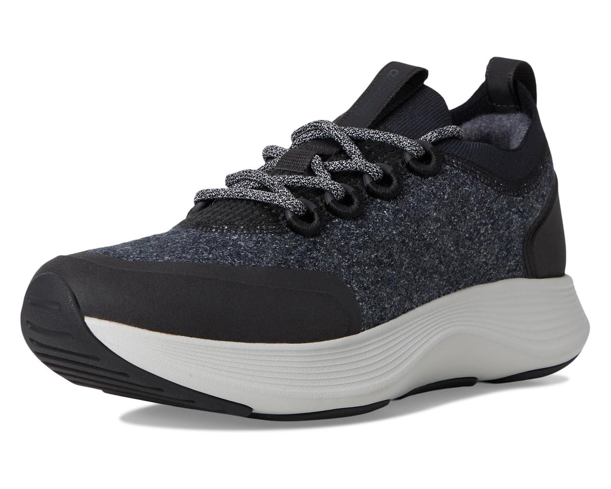 Dark grey speckled lace-up sneaker with black panels and white sole, side view