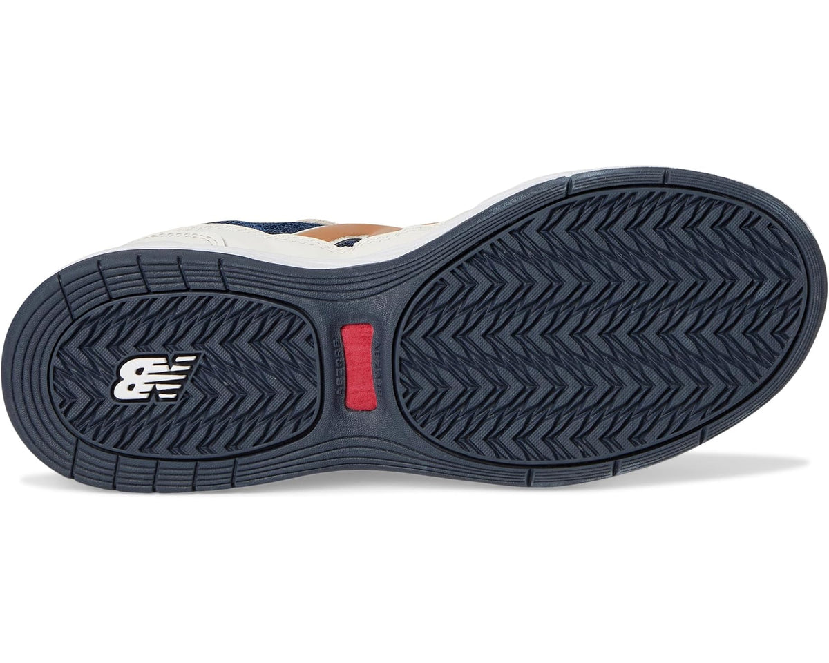 New Balance sneakers outsole with dark tread and red center detail