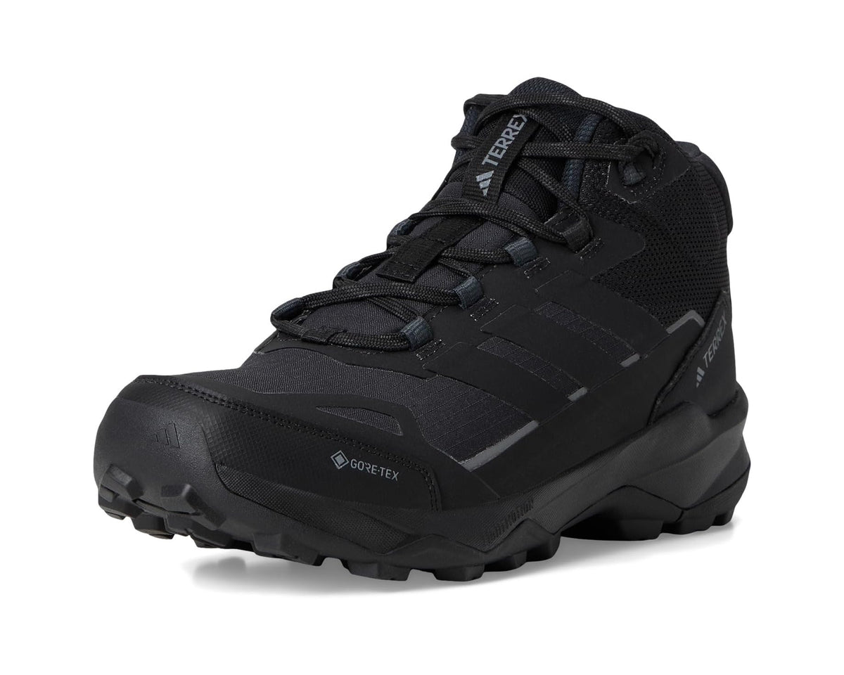 Black mid-top hiking shoe front 3/4 view with lace-up closure and tread