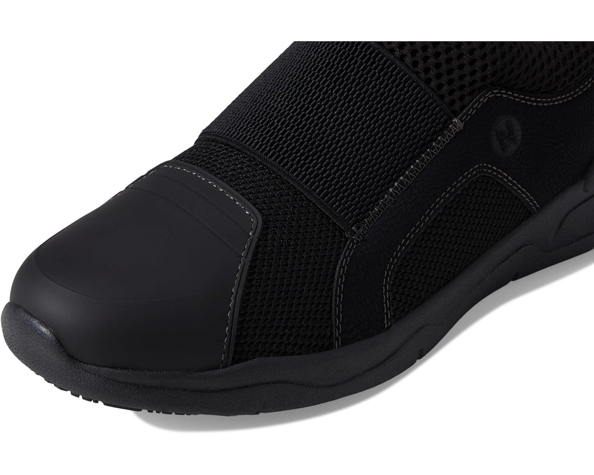 Black slip-on work shoe toe and side panel detail with padded sole